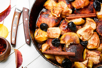 Stewed meat with apples.