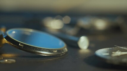 Nice watchmaker's workshop with many parts and gears, disassembled mechanical watch,