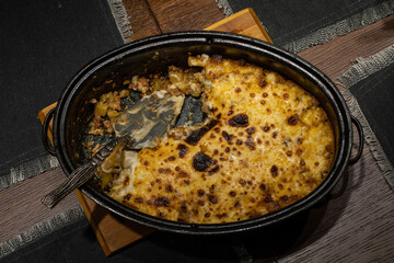 Moussaka in a traditional ceramic pot
