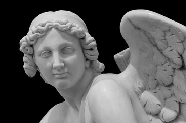 White angel of death against black isolated background as a symbol of the end of life. Ancient...
