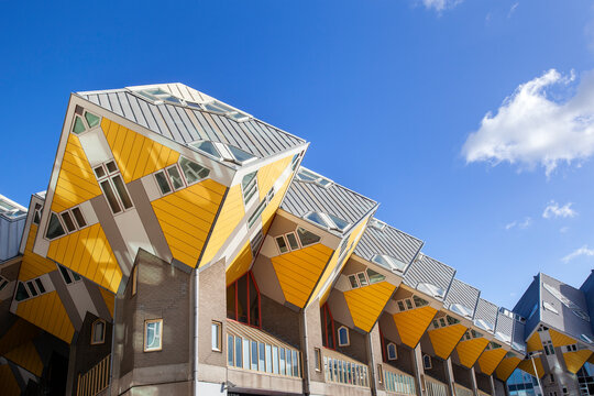 Yellow cubic houses or kubuswoningen by architect Piet Blom on the Overblaak in Rotterdam