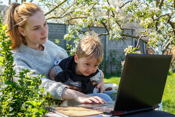 Coronavirus. Quarantine. Online training, distant remot work. Laptop and kid toys on the table. Work from home with children, home office. Workplace at home. Coronavirus pandemic in the world.Covid 19