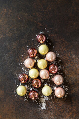 Christmas composition. Christmas glossy ball fir-tree. Top view flat lay background.