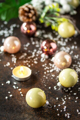 Christmas composition. Christmas glossy ball and a candle.