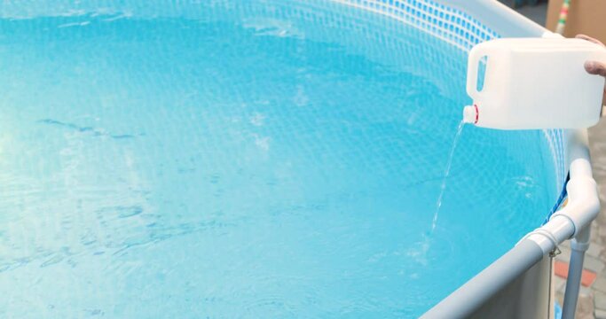Cleaning a PVC frame pool from algae by pouring perhydrol, Concept of cleaning services.