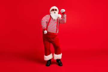 Fototapeta na wymiar Full length body size view of his he nice handsome bearded fat overweight cool childish Santa dancing rest chill out x-mas isolated bright vivid shine vibrant red color background
