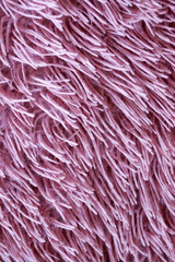 Fototapeta premium faux pink fur, vertical texture for background