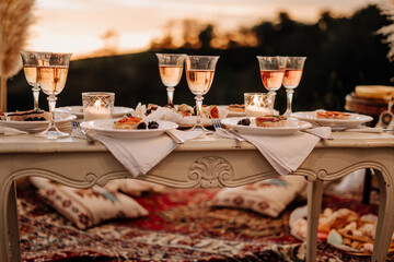Wine Wineglasses and Snacks on Festival Table