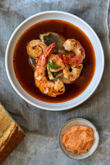 Bouillabaiss, French fish soup with sea bass and prawns