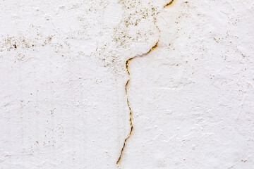 Surface of a wall with worn paint
