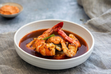 Bouillabaiss, French fish soup with sea bass and prawns