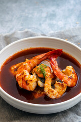Bouillabaiss, French fish soup with sea bass and prawns