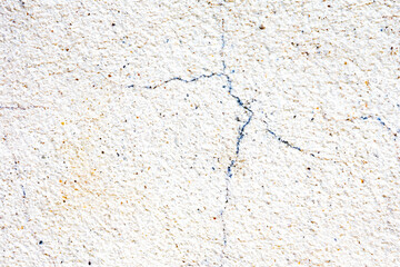 Surface of a wall with worn paint