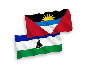 Flags of Lesotho and Antigua and Barbuda on a white background