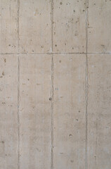 Light colored, concrete panels background. Vertical photo