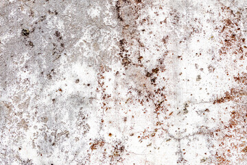 Surface of a wall with worn paint