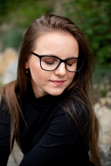 Portrait of a girl with glasses. Eye health thanks to glasses