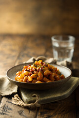 Pasta with tomato sauce and salami