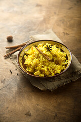 Delicious rice with spices in a bowl