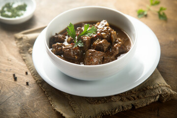 Traditional homemade beef ragout with fresh parsley