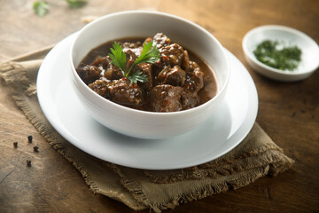 Traditional homemade beef ragout with fresh parsley