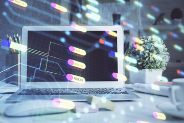 Double exposure of desktop with personal computer on background and tech theme drawing. Concept of Bigdata.