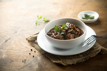 Traditional homemade beef ragout with fresh parsley