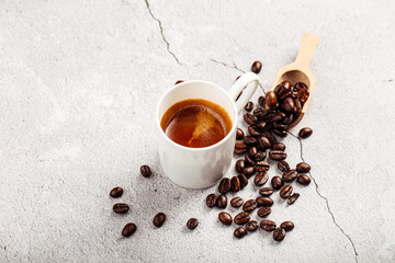 Obraz na płótnie Canvas Brewed espresso coffee in a white mug