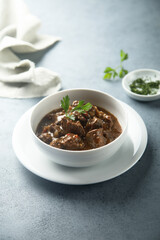 Traditional homemade beef ragout with fresh parsley