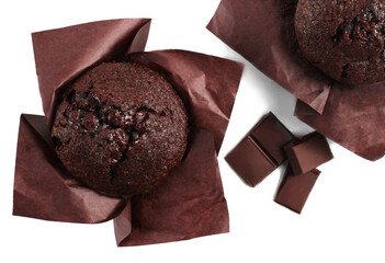 Chocolate muffins and chocolate bars isolated on a white background. Top view