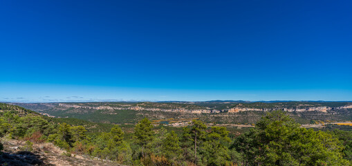 Cuenca mountain range under clear blue sky - obrazy, fototapety, plakaty