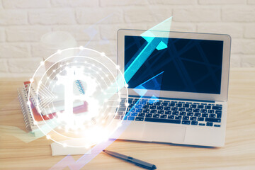 Double exposure of blockchain theme hologram and table with computer background. Concept of bitcoin...