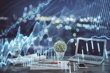 Forex market chart hologram and personal computer background. Double exposure. Concept of investment.