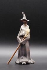Ceramic witch. expressionist design with baked clay,