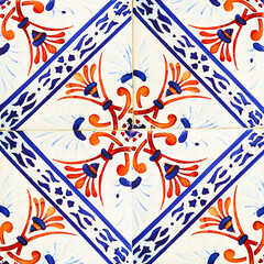 Detail of the traditional tiles from facade of old house. Decorative tiles.Portuguese traditional tiles. Floral ornament.