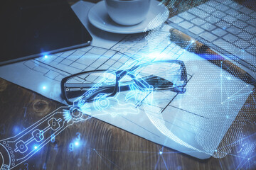 Tech theme hologram with glasses on the table background. Technology concept. Double exposure.