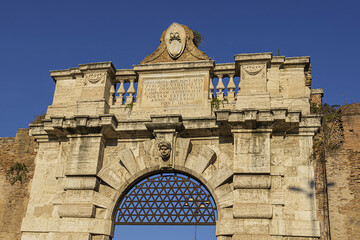 Aurelian Wall and Porta San Giovanni (San Giovanni gate, 1574) in city Rome. Italy.