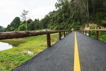 Fototapeta na wymiar Bike lane at Namtok Samlan National Park in Saraburi Thailand is a reservoir that tourists come to relax or camping during the holiday