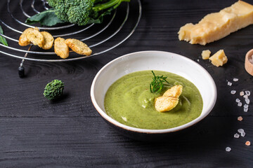 Broccoli cream soup with parmesan. Vegetarian dish. banner, catering menu recipe place for text, top view