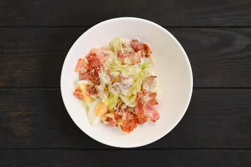  Salad with bacon, egg, cabbage and grated cheese