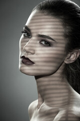 Fototapeta premium Beautiful Brunette Girl. Healthy Long Hair and Holiday Makeup.