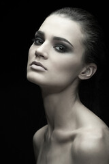 Beautiful Brunette Girl. Healthy Long Hair and Holiday Makeup.