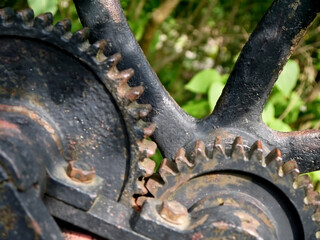 Old metal mechanism. Rotating gears. - 390373958