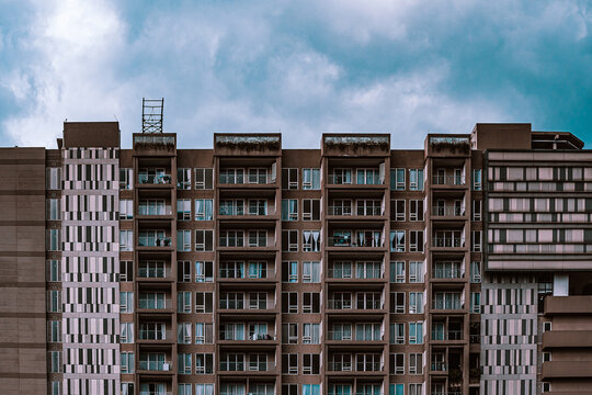 Blue sky and square old apartment