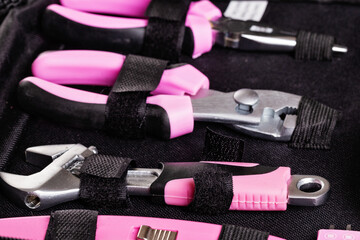 Home master's toolkit with pink handles