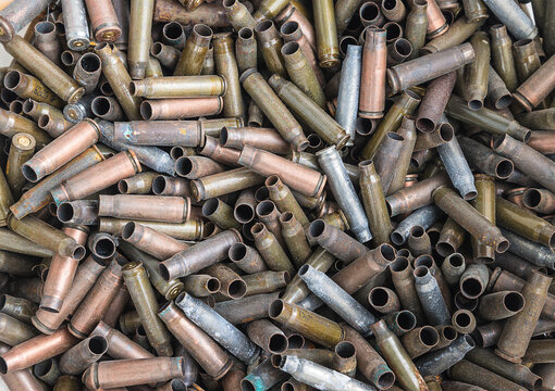 Old Used Bullet Shells Background