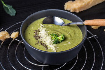 Delicious cheesy broccoli soup with parmesan and crispy croutons. banner, catering menu recipe. top view