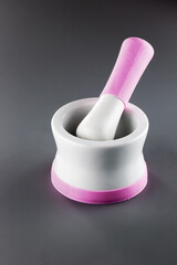 lovely ceramic mortar with pestle for pounding food in the kitchen and in medicine