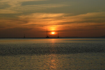Sunset over the beaches on the untouced paradise island of Ko Phayam in the Andaman Sea, Thailand