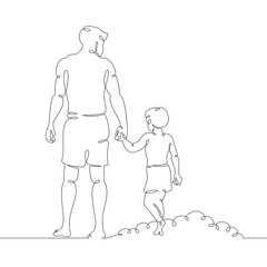 A young male father with his son walks along the beach.